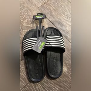 Black slides. New with tags. Size 9-10 men’s.